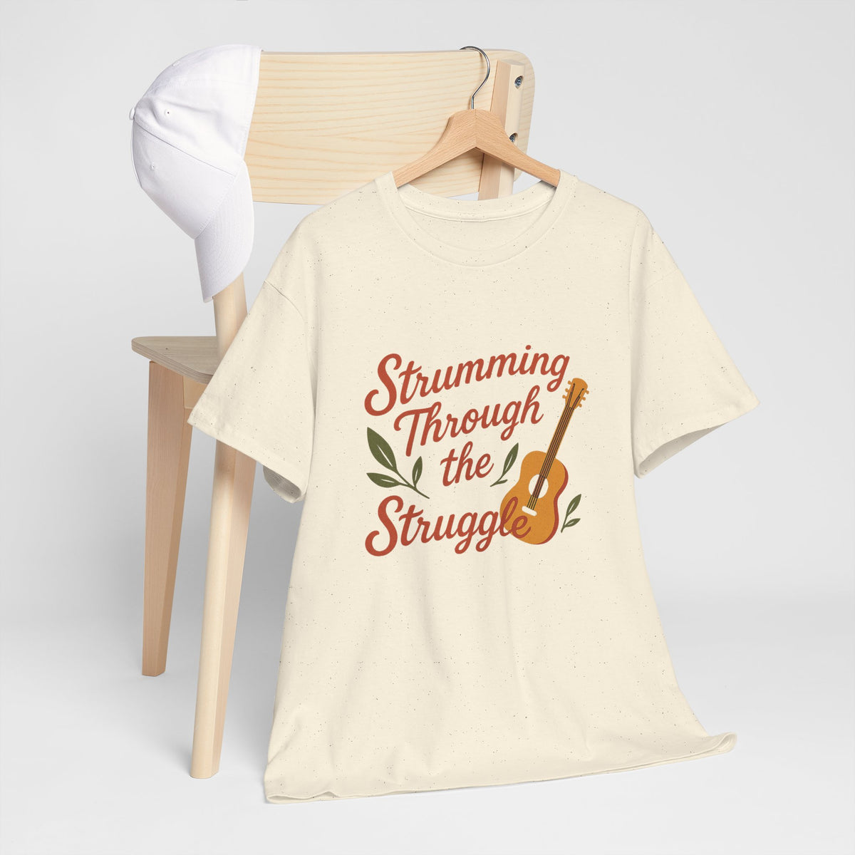 Strumming Through the Struggle, Comfortable, Unisex, Cotton Tee - Music Lover Shirt