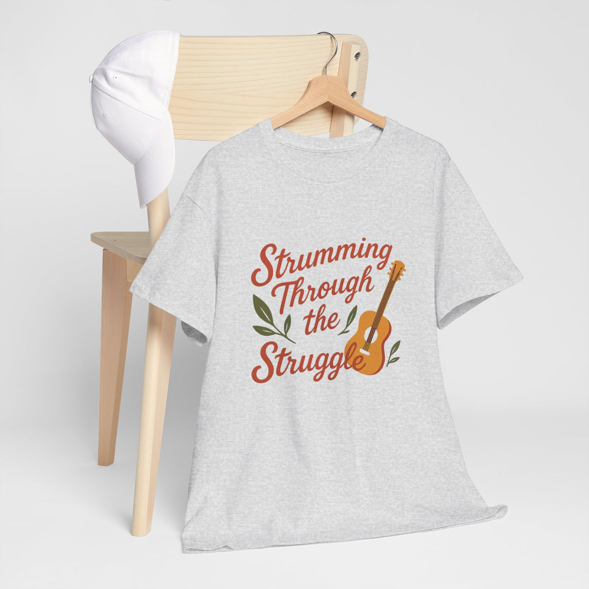 Strumming Through the Struggle, Comfortable, Unisex, Cotton Tee - Music Lover Shirt