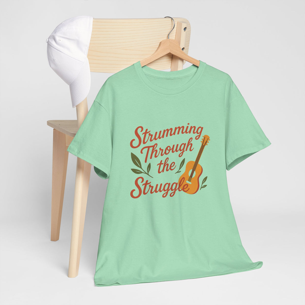 Strumming Through the Struggle, Comfortable, Unisex, Cotton Tee - Music Lover Shirt